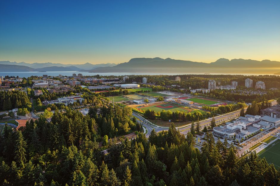 Aerial image of the UBC Point Grey campus at sunset.
