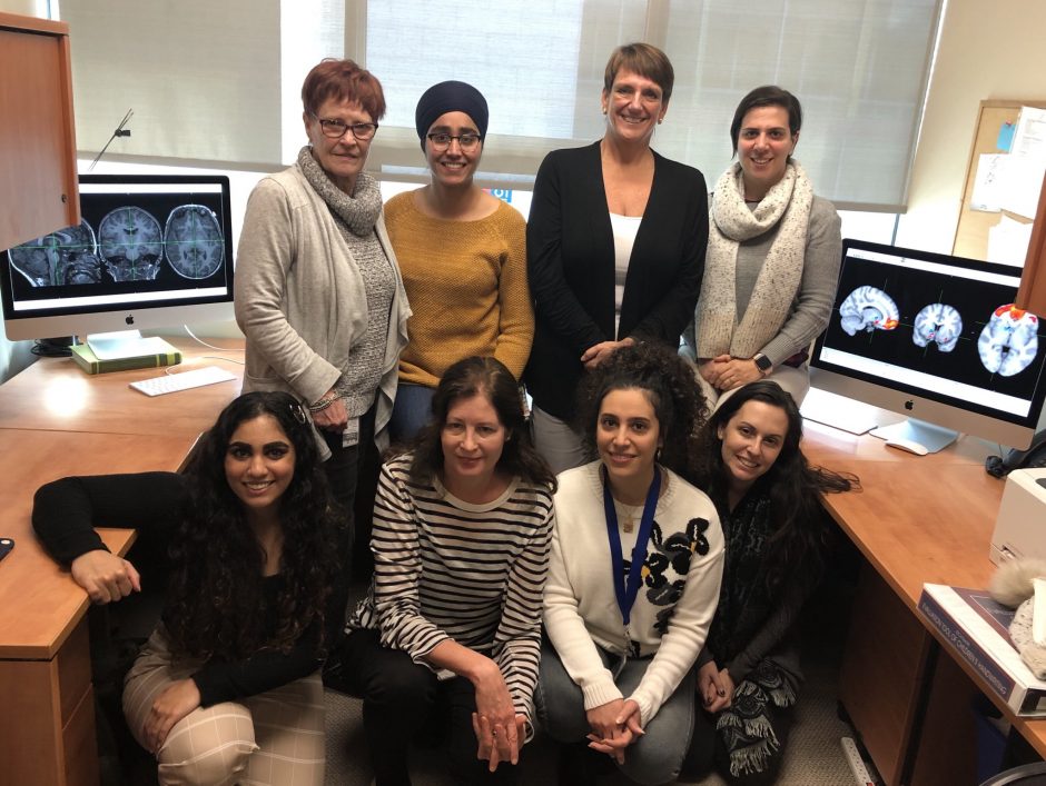Jill Zwicker and a group of occupational therapy students in a brain imaging lab