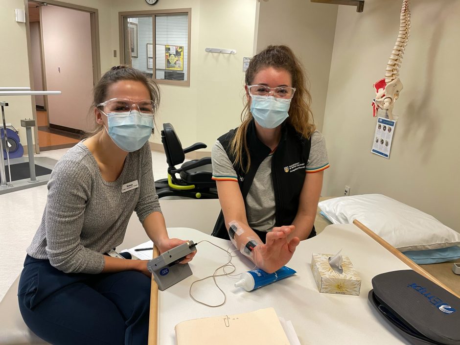 Two students preparing for clinical practice