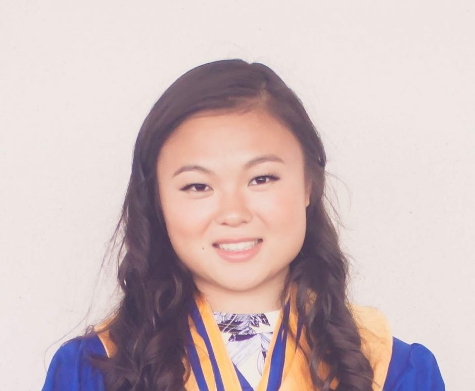 A headshot of Chloe Gao wearing a graduation gown to a white backdrop
